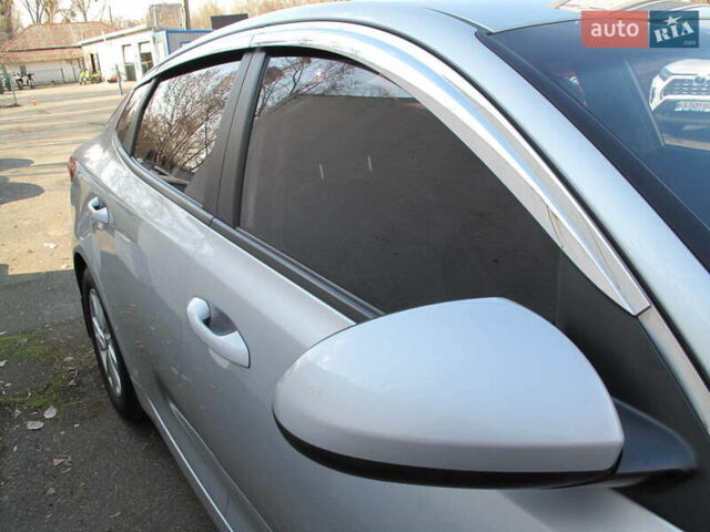 Серый Киа K5, объемом двигателя 2 л и пробегом 309 тыс. км за 11700 $, фото 47 на Automoto.ua
