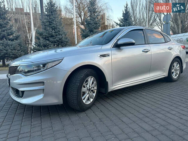 Серый Киа K5, объемом двигателя 2 л и пробегом 292 тыс. км за 11000 $, фото 10 на Automoto.ua