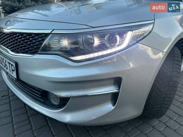 Серый Киа K5, объемом двигателя 2 л и пробегом 292 тыс. км за 11000 $, фото 46 на Automoto.ua