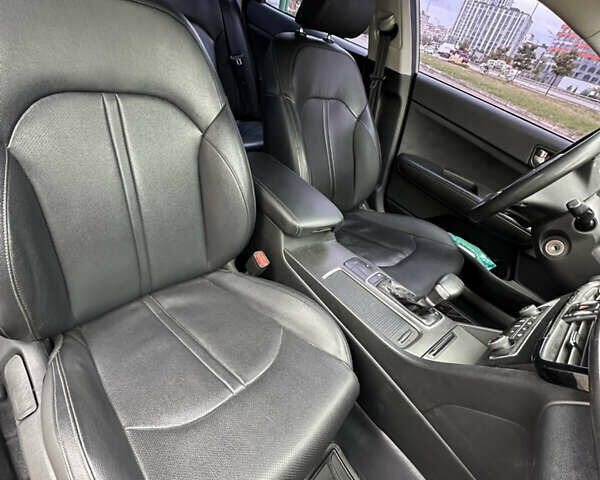 Сірий Кіа K5, об'ємом двигуна 2 л та пробігом 305 тис. км за 10850 $, фото 6 на Automoto.ua