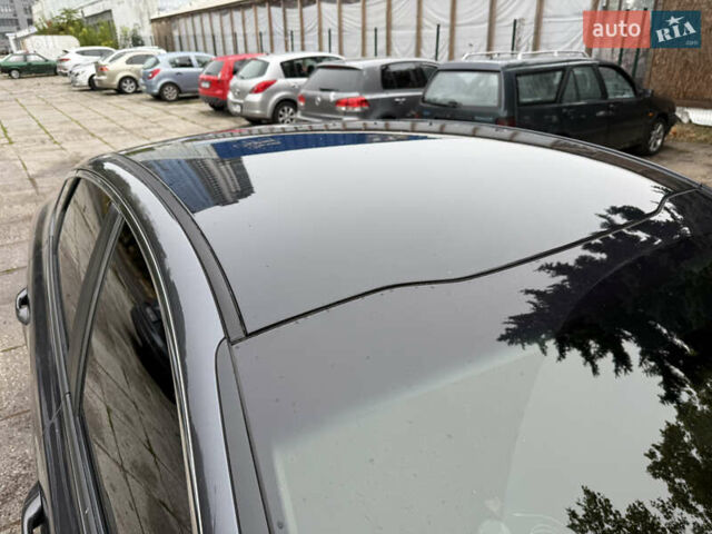 Серый Киа K5, объемом двигателя 2 л и пробегом 153 тыс. км за 13500 $, фото 9 на Automoto.ua