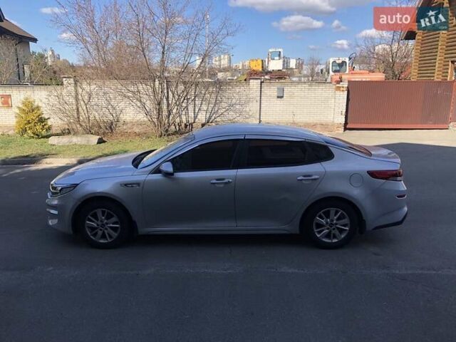 Серый Киа K5, объемом двигателя 2 л и пробегом 419 тыс. км за 8690 $, фото 7 на Automoto.ua