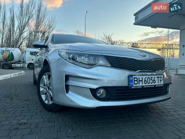 Серый Киа K5, объемом двигателя 2 л и пробегом 292 тыс. км за 11000 $, фото 14 на Automoto.ua