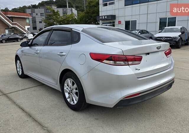 Серый Киа K5, объемом двигателя 2 л и пробегом 190 тыс. км за 12490 $, фото 3 на Automoto.ua