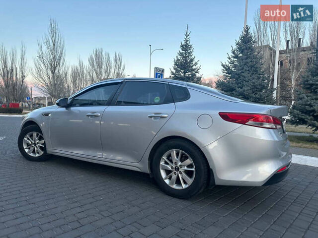 Серый Киа K5, объемом двигателя 2 л и пробегом 292 тыс. км за 11000 $, фото 8 на Automoto.ua