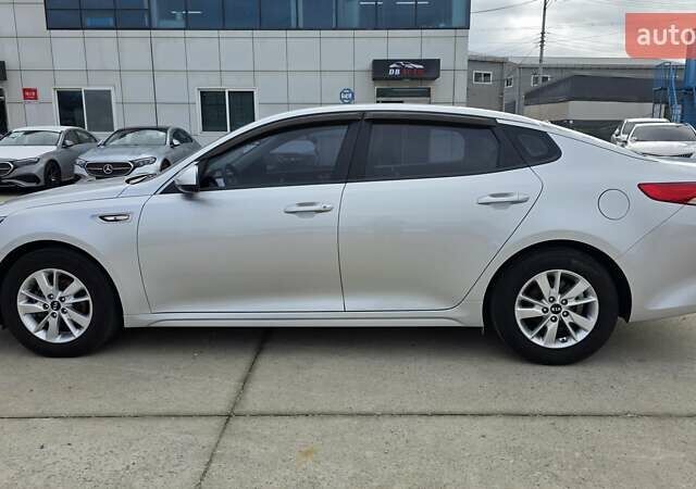 Серый Киа K5, объемом двигателя 2 л и пробегом 190 тыс. км за 12490 $, фото 7 на Automoto.ua