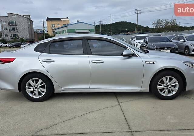 Серый Киа K5, объемом двигателя 2 л и пробегом 190 тыс. км за 12490 $, фото 6 на Automoto.ua