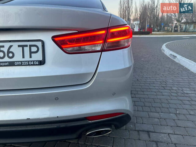 Серый Киа K5, объемом двигателя 2 л и пробегом 292 тыс. км за 11000 $, фото 48 на Automoto.ua