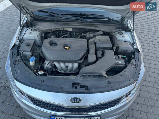Серый Киа K5, объемом двигателя 2 л и пробегом 292 тыс. км за 11000 $, фото 42 на Automoto.ua