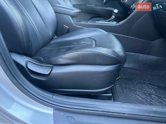 Серый Киа K5, объемом двигателя 2 л и пробегом 292 тыс. км за 11000 $, фото 34 на Automoto.ua