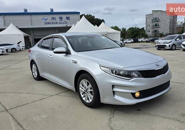 Серый Киа K5, объемом двигателя 2 л и пробегом 190 тыс. км за 12490 $, фото 2 на Automoto.ua