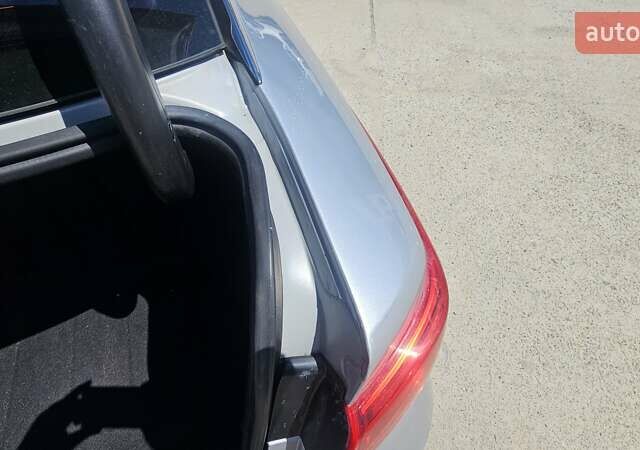 Сірий Кіа K5, об'ємом двигуна 2 л та пробігом 322 тис. км за 11990 $, фото 12 на Automoto.ua