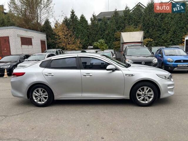 Серый Киа K5, объемом двигателя 2 л и пробегом 244 тыс. км за 11990 $, фото 6 на Automoto.ua