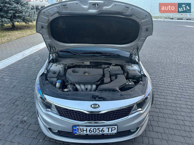 Серый Киа K5, объемом двигателя 2 л и пробегом 292 тыс. км за 11000 $, фото 41 на Automoto.ua