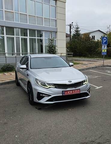 Серый Киа K5, объемом двигателя 2 л и пробегом 206 тыс. км за 14900 $, фото 2 на Automoto.ua