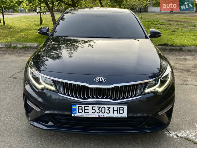 Серый Киа K5, объемом двигателя 2 л и пробегом 157 тыс. км за 18200 $, фото 2 на Automoto.ua
