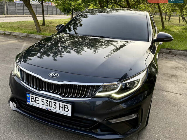 Серый Киа K5, объемом двигателя 2 л и пробегом 157 тыс. км за 18200 $, фото 1 на Automoto.ua