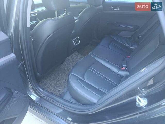 Серый Киа K5, объемом двигателя 2 л и пробегом 193 тыс. км за 20700 $, фото 8 на Automoto.ua