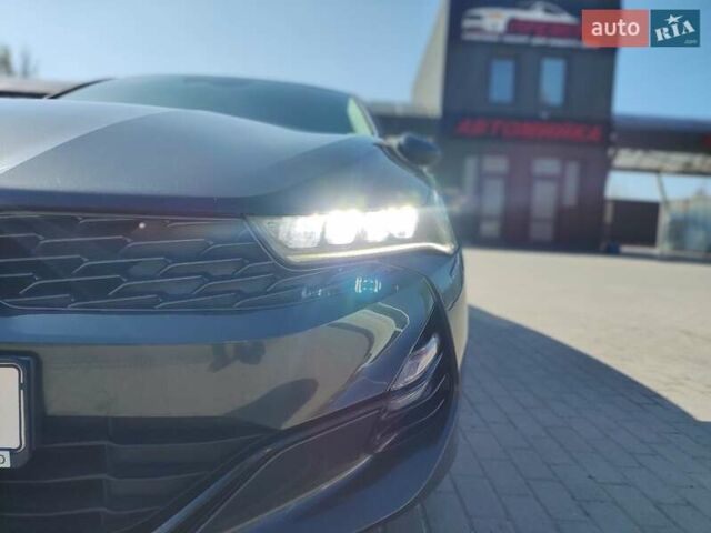 Серый Киа K5, объемом двигателя 2 л и пробегом 193 тыс. км за 20800 $, фото 6 на Automoto.ua