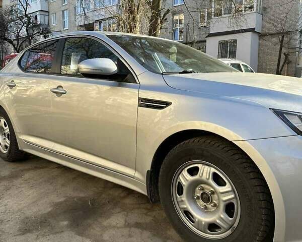 Синий Киа K5, объемом двигателя 2 л и пробегом 225 тыс. км за 7990 $, фото 11 на Automoto.ua