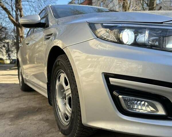 Синий Киа K5, объемом двигателя 2 л и пробегом 225 тыс. км за 7990 $, фото 24 на Automoto.ua