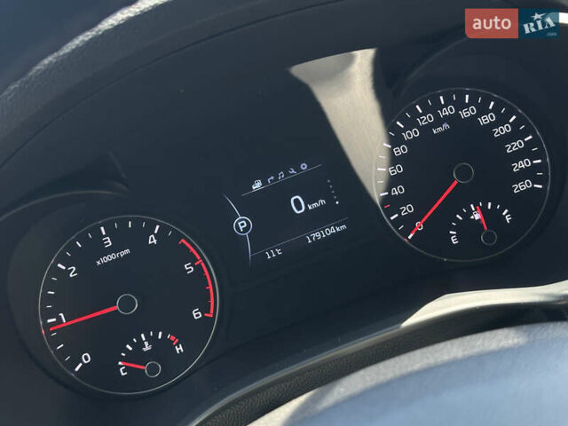 Синий Киа K5, объемом двигателя 1.69 л и пробегом 179 тыс. км за 13500 $, фото 25 на Automoto.ua