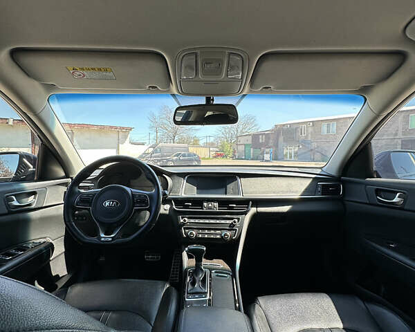 Синий Киа K5, объемом двигателя 1.69 л и пробегом 179 тыс. км за 13500 $, фото 22 на Automoto.ua