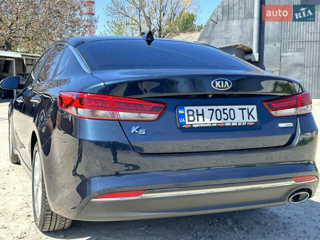 Синий Киа K5, объемом двигателя 1.69 л и пробегом 179 тыс. км за 13500 $, фото 9 на Automoto.ua