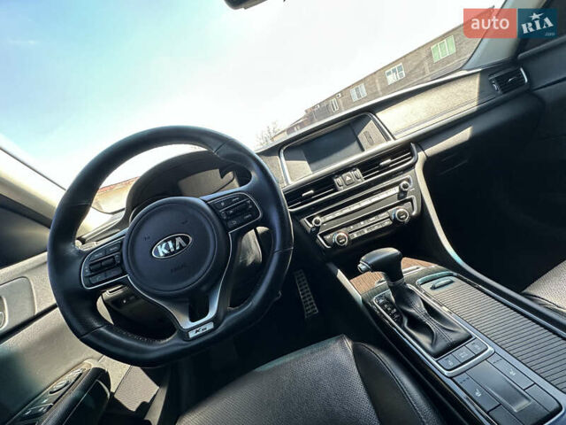 Синий Киа K5, объемом двигателя 1.69 л и пробегом 179 тыс. км за 13500 $, фото 23 на Automoto.ua
