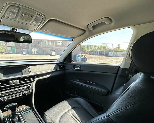 Синий Киа K5, объемом двигателя 1.69 л и пробегом 179 тыс. км за 13500 $, фото 21 на Automoto.ua
