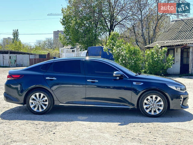 Синий Киа K5, объемом двигателя 1.69 л и пробегом 179 тыс. км за 13500 $, фото 4 на Automoto.ua