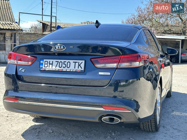 Синий Киа K5, объемом двигателя 1.69 л и пробегом 179 тыс. км за 13500 $, фото 10 на Automoto.ua