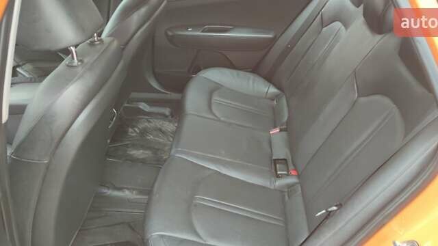 Помаранчевий Кіа K5, об'ємом двигуна 2 л та пробігом 495 тис. км за 9800 $, фото 2 на Automoto.ua