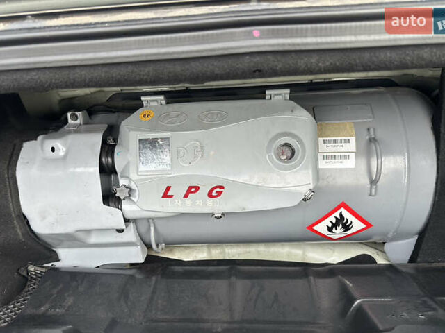 Белый Киа K7, объемом двигателя 3 л и пробегом 235 тыс. км за 11699 $, фото 39 на Automoto.ua