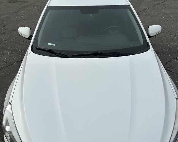 Белый Киа K7, объемом двигателя 3 л и пробегом 235 тыс. км за 11699 $, фото 41 на Automoto.ua