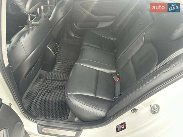 Белый Киа K7, объемом двигателя 3 л и пробегом 235 тыс. км за 11699 $, фото 33 на Automoto.ua