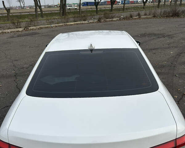 Белый Киа K7, объемом двигателя 3 л и пробегом 235 тыс. км за 11699 $, фото 40 на Automoto.ua