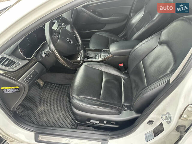 Белый Киа K7, объемом двигателя 3 л и пробегом 235 тыс. км за 11699 $, фото 35 на Automoto.ua