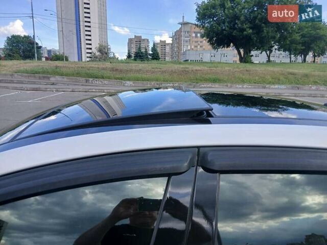Белый Киа K7, объемом двигателя 3 л и пробегом 246 тыс. км за 11800 $, фото 2 на Automoto.ua