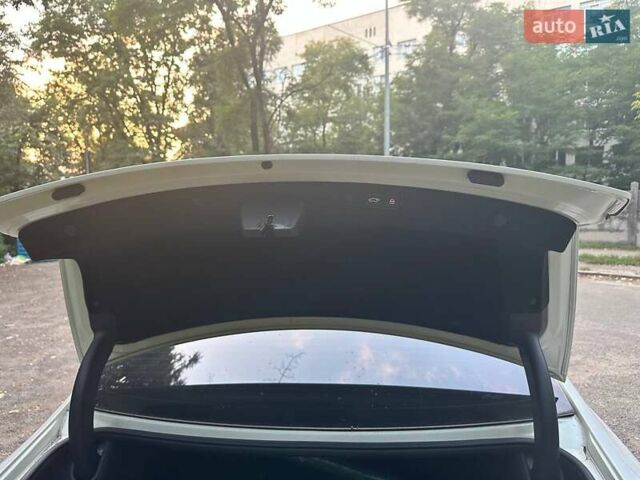 Білий Кіа K7, об'ємом двигуна 2.2 л та пробігом 188 тис. км за 21000 $, фото 29 на Automoto.ua