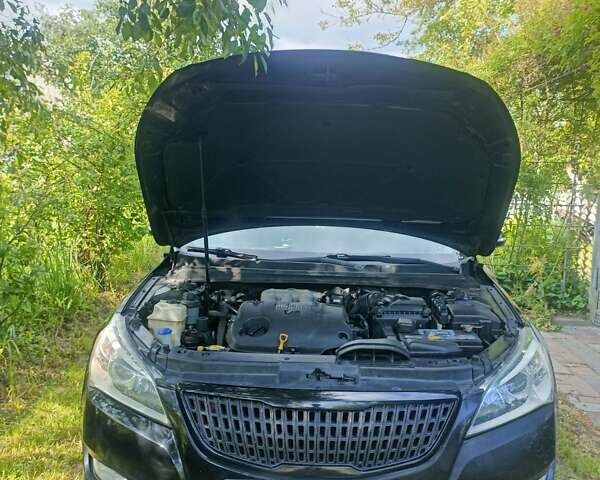 Черный Киа K7, объемом двигателя 2.7 л и пробегом 279 тыс. км за 6999 $, фото 11 на Automoto.ua