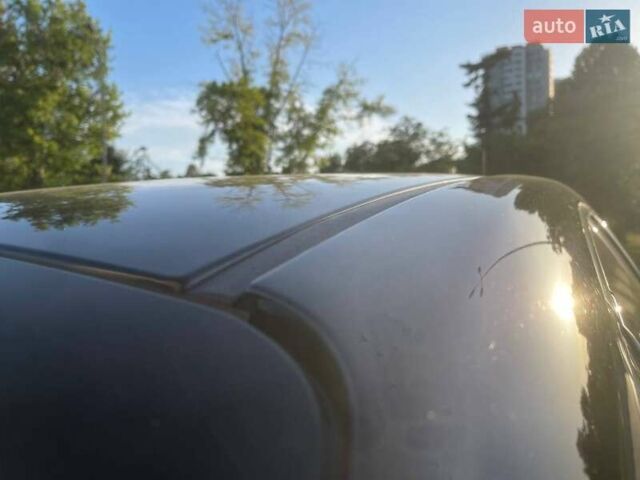 Черный Киа K7, объемом двигателя 2.2 л и пробегом 240 тыс. км за 18800 $, фото 41 на Automoto.ua