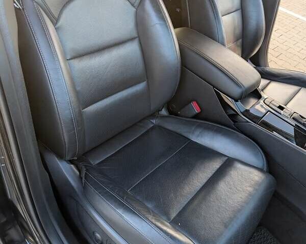 Черный Киа K7, объемом двигателя 2.2 л и пробегом 205 тыс. км за 19500 $, фото 7 на Automoto.ua