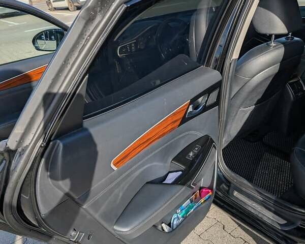 Черный Киа K7, объемом двигателя 2.2 л и пробегом 205 тыс. км за 19500 $, фото 5 на Automoto.ua