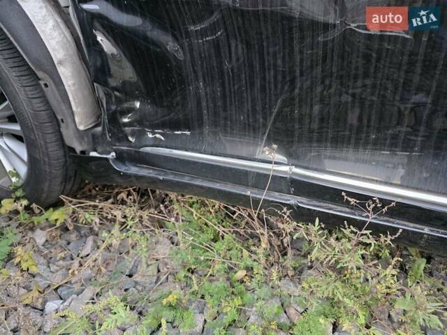 Черный Киа K7, объемом двигателя 3 л и пробегом 114 тыс. км за 9000 $, фото 12 на Automoto.ua