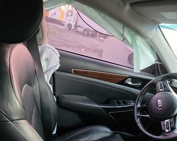 Черный Киа K7, объемом двигателя 3 л и пробегом 114 тыс. км за 9000 $, фото 1 на Automoto.ua