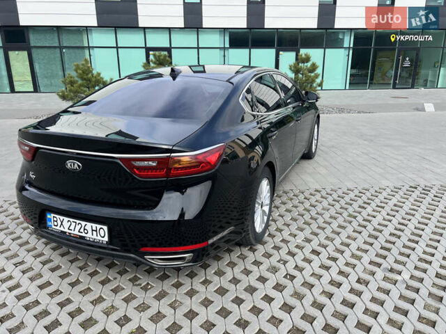 Черный Киа K7, объемом двигателя 3 л и пробегом 250 тыс. км за 17000 $, фото 2 на Automoto.ua