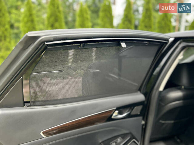 Чорний Кіа K7, об'ємом двигуна 3 л та пробігом 173 тис. км за 19700 $, фото 47 на Automoto.ua