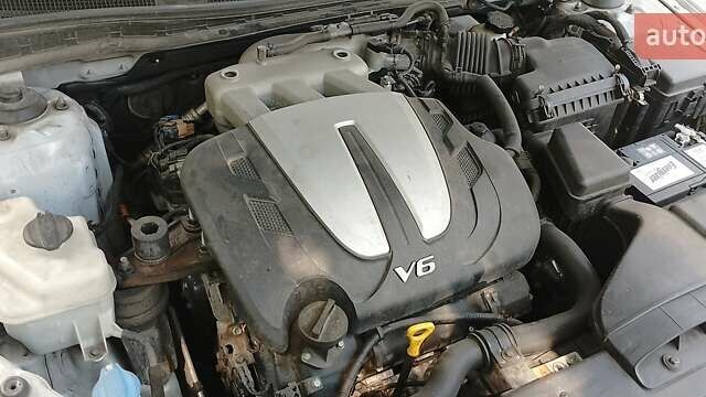 Серый Киа K7, объемом двигателя 3 л и пробегом 215 тыс. км за 7980 $, фото 11 на Automoto.ua