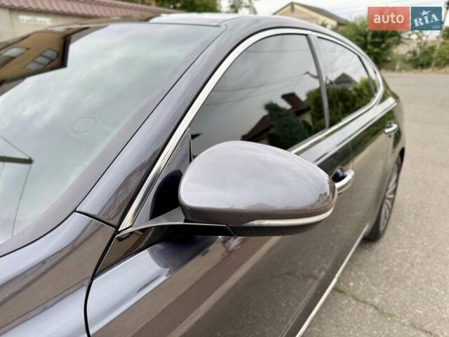 Серый Киа K7, объемом двигателя 3 л и пробегом 210 тыс. км за 13900 $, фото 11 на Automoto.ua